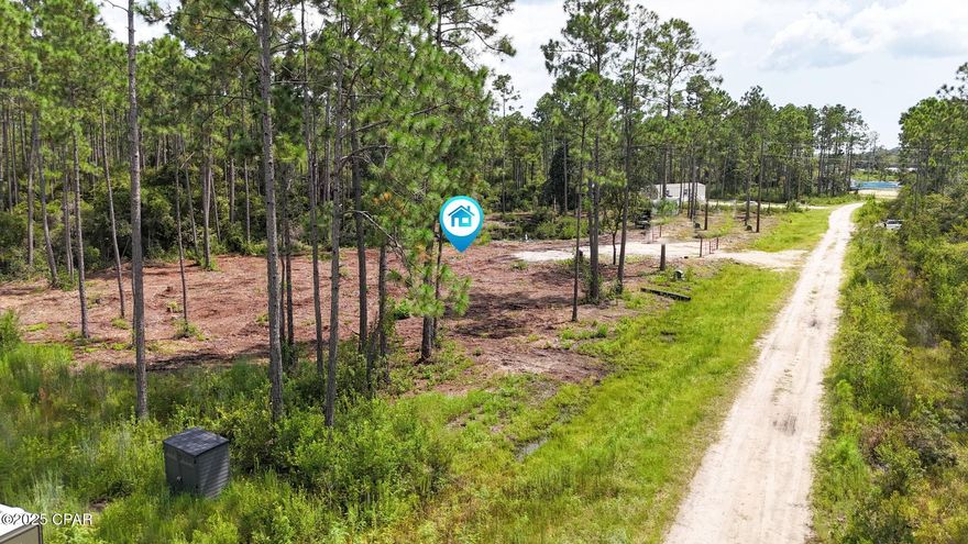 Spacious 1.63-acre lot offering a perfect mix of open space and mature trees. No HOA restrictions and mobile homes are allowed, giving you the flexibility to create the lifestyle you want. A great opportunity to build your home in a peaceful setting!