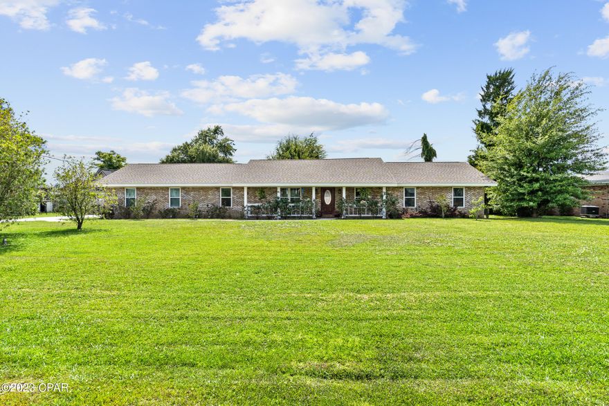 CURRENTLY UNDER CONTRACT, SELLER WILL CONSIDER BACKUP OFFERS. Welcome to this stunning and fully renovated POOL home nestled in the quiet neighborhood of Lynn Haven. With 4 bedrooms and 3 full bathrooms, this spacious residence offers ample room for comfortable living. Spanning 2,280 square feet, this home provides a perfect blend of elegance and functionality. The home sits on an expansive .55-acre lot, allowing for plenty of outdoor enjoyment. Take a dip in the pool, perfect for refreshing swims during warm Florida days, or spend the evening in the jacuzzi relaxing. The backyard also provides ample space for outdoor activities or creating a dream oasis for yourself or family and friends to enjoy. 

As you enter, you'll be greeted by distinct rooms that exude a warm and inviting atmosphere. The living room boasts a cozy fireplace, creating a focal point for gatherings and relaxation. The eat-in kitchen is sure to bring out your inner chef! It is equipped with stainless steel appliances, granite countertops, an island, double pantry, and gorgeous cabinets, all ensuring that culinary adventures are a breeze. 

The primary bedroom is spacious, has a large closet, and a full bathroom featuring a tiled shower with bench seating. The other bedrooms have plenty of space for sleep or study, and have access to an additional full bathroom with shower/bathtub combo and vanity with lots of storage. 

This property offers numerous upgrades, including a new roof, flooring, and windows ensuring peace of mind for years to come. Additionally, the home features paid-off solar panels specifically designed to heat the pool, allowing you to enjoy a swim year-round while saving on energy costs. The pool has also been resurfaced, and has a new pool pump. You'll also love the oversized laundry room, and aesthetically pleasing side entry 2 car garage.

Located in a serene neighborhood, this home offers a tranquil retreat while still being close to all amenities. Enjoy nearby parks, schools, and the convenience of having no HOA fees. 

This is an exceptional opportunity to own a fully renovated pool home in Lynn Haven and is a must see!