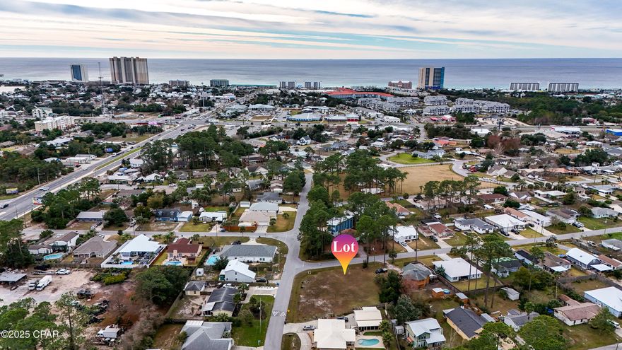 Build your coastal vision just minutes from Panama City Beach. Versatile vacant property offering the option to use as two individual lots or one larger homesite, located just minutes from Panama City International Airport and Panama City Beach. The property features paved road access, utilities nearby, and is located outside of a flood zone, making it well suited for a variety of residential building plans.

Conveniently situated near Pier Park, Top Golf, shopping, dining, and public beach access, this location provides excellent accessibility while remaining in a growing residential area with both established and newer homes.

Whether you are a builder, investor, or end user looking for flexibility, this property offers multiple development possibilities and presents strong potential in a high-demand coastal market. Enjoy quick access to sugar-white beaches, boating, fishing, and year-round outdoor recreation with no HOA.

Buyer to verify zoning, lot configuration, utilities, and building requirements.