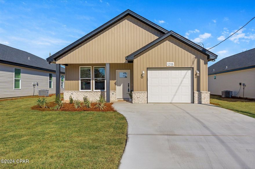 'CURRENTLY UNDER CONTRACT, SELLER ACCEPTING BACKUP OFFERS'
New Construction Home built by G6 Development, move in ready located in Southport, Florida!! This beautiful 3BR/2BA 1,502 SqFt house is conveniently located near schools, parks, boat launches, and only minutes away from Lynn Haven with shopping, dining, and much more. This home features many upgraded custom designer touches from the open concept floorplan with 9ft  Ceilings throughout, custom built mud room bench, decorative accent wainscoting walls and trim,   large open living room with tray ceiling, recessed lighting, ceiling fans, vinyl plank flooring, carpeted bedrooms, tile baths,  blinds on all windows, upgraded black fixtures and door knobs, kitchen  center island/breakfast bar with gorgeous Quartz countertops, white Soft Close cabinets, stainless steel appliance package including side by side Refrigerator, oversized pantry,  large laundry room with additional cabinets and countertop, master suite boasts tray ceiling, large walk-in closet, master bath includes double vanities with middle sit-down area with Quartz tops, and tile flooring. The exterior features a beautifully landscaped yard situated on 50X150 lot with sprinkler system, covered front porch, Vinyl Siding with stylish front brick skirt, single car garage, dimensional shingles with a 30-year warranty, covered back patio, septic system installed and connected to Bay County water.  Builder will provide a 1 Year Builders Warranty at closing. Verify all dimensions and information if important.