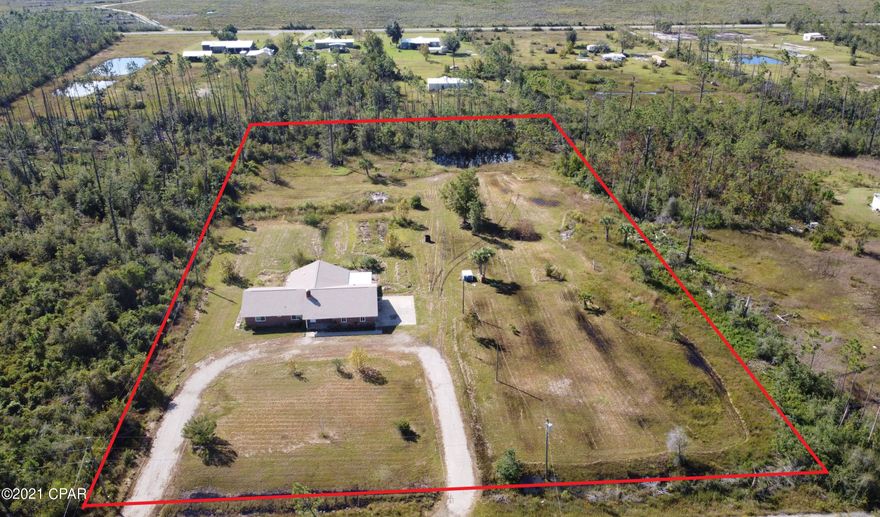 UNDER CONTRACT TAKING BACKUP OFFERS. 5 acres!! Total Renovation!! Peace and quiet, all just minutes away. This home has been completely transformed. Main spaces feel very open, bright and airy with plenty of natural light. Double sided brick fireplace. Beautiful luxury vinyl plank throughout, custom cabinetry and quartz countertops. Craftsman style trim throughout. Plenty of dining space. Master suite features a huge walk in closet, spacious bath with tile shower and separate tub. Nice sized guest rooms. This home has plenty of space for a large family. Both guest baths have been renovated, one is a Jack and Jill. Large Den or could be a spacious master bedroom. Small pond on the property. Bring the horses! New roof, all new windows. Nice covered patio. Oversized 2 car garage. Close to TAFB and Sandy Creek Air Park. Located right by East Bay and Cook Bayou Marina.