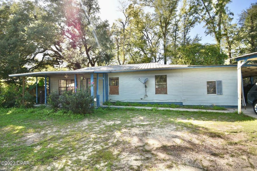 Investor alert! This 4-bedroom, one-bathroom vinyl siding home in Marianna needs work but has a lot of potential! It would be great for a rental, fix and flip, or fix it up and live in it. It has a metal roof and is ducted for central a/c but currently has no a/c. The main part of the home is on a slab. It has a one car carport and a nice small front and back yard. There are no utilities on and won't be turned on prior to closing. Home is being sold as-is, all contents convey, and all sizes are approximate and should be verified by buyer if important. Cash only!