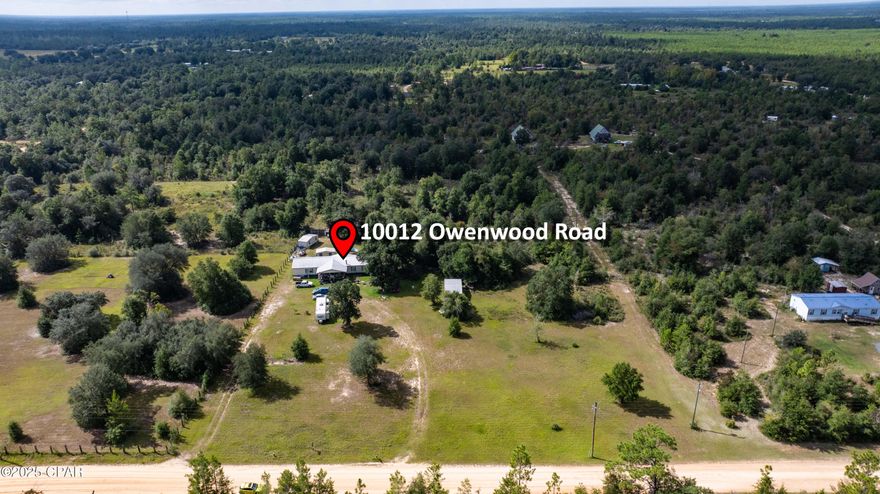 Welcome to 10012 Owenwood Rd in Fountain. This 3 bedroom, 2 bath manufactured home offers 1,976 sq. ft. of living space and was built in 1999. The home features an open floor plan with a split bedroom layout and sits on 5 acres in a quiet, private setting. Located about 40 minutes from Panama City Beach, the property provides plenty of room for gardening, animals, or future improvements.