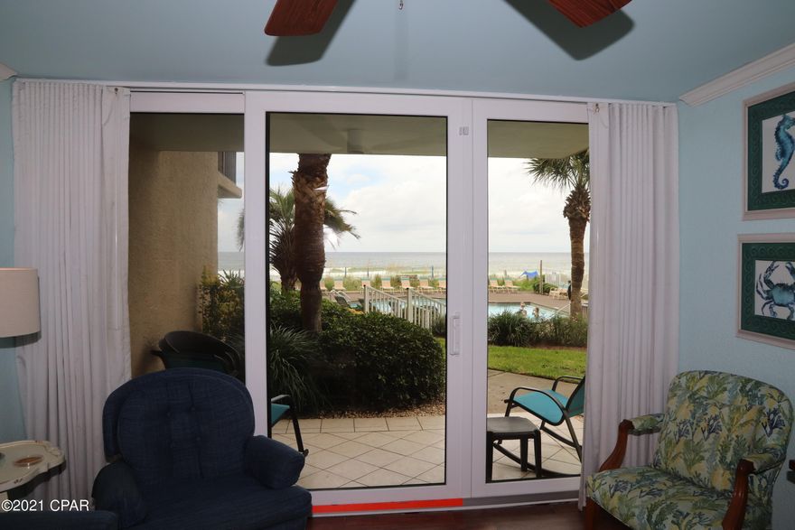 FIRST FLOOR ALERT - Feels like your own beach house.  Park, walk in your front door, walk out your back door right to the pool and the gulf.   COMPLETELY UPDATED AND UPGRADED.  HVAC - 2 YEARS OLD, hot water heater 4 years old.  NEW SLIDING GLASS DOORS (Over $10,000 upgrade).  No popcorn ceilings, Coastal Green Air system, UPGRADED WOOD-LOOK TILE THROUGHOUT.  If you haven't looked at Pelican Walk recently, take a look.  PICKLEBALL courts, shuffleboard courts, raquetball courts, tons of amenities.   Kitchen also completely remodeled with granite.  MURPHY BED.  2 FULL BATHROOMS.