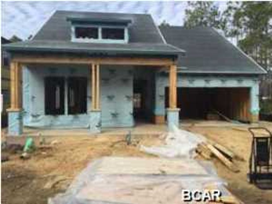 This gorgeous, energy efficient, David Weekley Home is sure to please. The home features a bedroom, full bath, dining room, laundry room, big open kitchen over looking the family room, a breakfast room as well as the owners retreat and owners bath all on the first floor. Beautiful 42'' upper kitchen cabinets finished in a linen color are perfectly complimented by the hand selected granite, tile kitchen back splash and stainless steel appliances. This home also features beautifully selected hardwood throughout. You will find your owners retreat in the back of the home featuring big windows to let in the Florida sunshine. Carpet in the owners bedroom, hand selected tile in the owners bathroom, hand painted linen cabinets in the owners bathroom and the best part, a SUPER shower! The