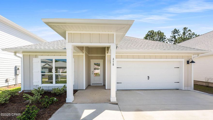Welcome to 458 Wolcott Way, a new home at Bayside at Ward Creek in Panama City Beach. This home is ready for move in and features the Rhett floorplan, a four-bedroom, two-bathroom home with over 1,700 square feet of living space. As you enter this home through the bright entryway you will find EVP flooring in the foyer leading to three guest bedrooms. Continuing through the foyer you will find an open and spacious living area. The kitchen serves as the heart of the home and features quartz countertops, beautiful white upper and lower cabinetry and a stainless-steel appliance package that includes a smooth top stove, microwave, and dishwasher. Enjoy spending time with guest and family comfortably with your open kitchen. 

  
 
The primary bedroom is located off the living area and has private ensuite bathroom with a large shower with glass enclosure, dual sink vanity with quartz countertops and lower cabinetry for storage, a separate water closet and large soak tub as well as a large closet. The guest bedrooms have spacious closets and share a full bathroom with shower and tub combination. Each bedroom has plush carpet and spacious closets. This home has a Home is Connected® Smart Home Technology Package.  

Enjoy afternoons or morning coffee from your covered back patio or relax on your front porch as you look out to your lawn and a flower bed off the entry walk. This home is located just a short walk from the community pool. Call us today for more information on this home.