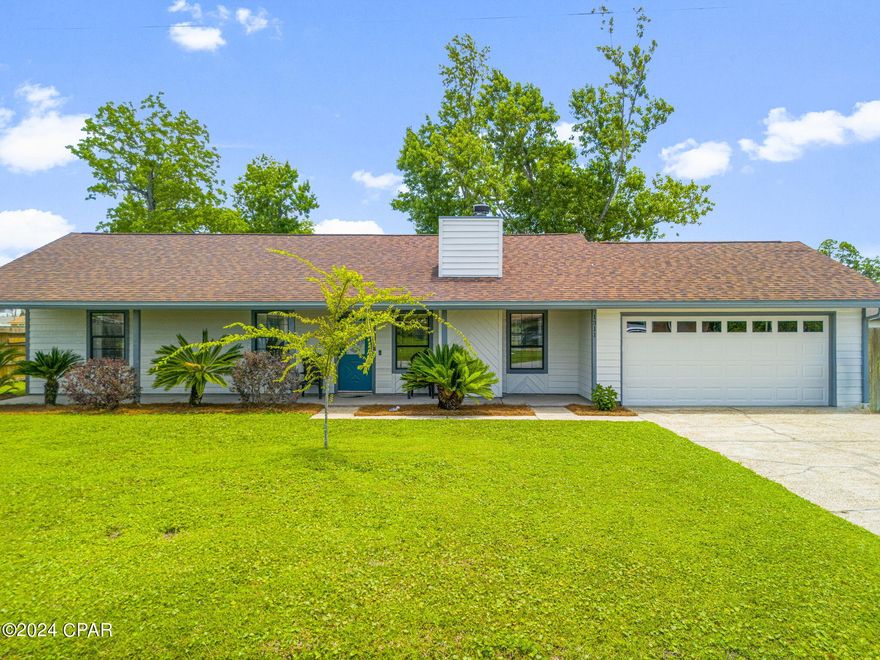 CURRENTLY UNDER CONTRACT, SELLER WILL CONSIDER BACKUP OFFERS. Nestled in the heart of Lynn Haven, this charming home offers an idyllic blend of comfort and convenience. Boasting proximity to excellent schools, the serene Bay, lush parks, and bustling shopping destinations, it presents an enviable lifestyle. Step inside to discover a cozy ambiance highlighted by a fully replaced and updated fireplace, setting the tone for warmth and relaxation. The kitchen is a culinary haven, featuring brand-new stainless-steel appliances and a fresh backsplash, creating an inviting space for cooking and gathering. Noteworthy is the absence of carpeting throughout the home, replaced instead with durable tile and luxury vinyl plank flooring, ensuring both style and easy maintenance. The kitchen seamlessly flows into the dining area, complemented by a convenient breakfast bar, perfect for casual meals or entertaining. Outside, convenience meets practicality with a designated boat or RV parking pad to the right of the driveway, offering ample space for recreational vehicles. The backyard hosts a versatile pole barn, primed for customization into a workshop. Already built and permitted, it boasts a sturdy 2-foot footer, requiring only the enclosure to fulfill its potential. A Shed was added for additional storage in 2021. Practical updates include a 2018 roof replacement, 2020 installation of an electric tankless water heater, and a 2018 HVAC replacement, ensuring comfort and efficiency year-round. Adding to the appeal, the entire exterior has received a fresh coat of paint in the past few months, enhancing curb appeal and providing a renewed aesthetic. With its prime location, modern amenities, and potential for customization, this Lynn Haven residence offers a rare opportunity to embrace coastal living at its finest.