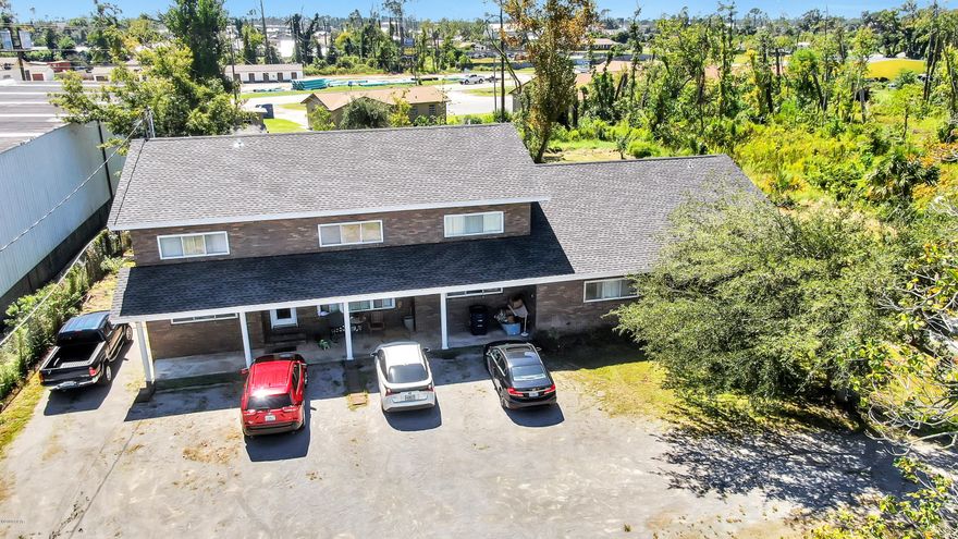 CENTRALLY LOCATED TRIPLEX WITH 3 CAR GARAGE! ***UNIT A*** 2 Bedrooms / 1 Bath & 876 SqFt. New HVAC in 2020. ***UNIT B*** 4 Bedrooms, 3.5 Baths, 3,072 SqFt, 2 living rooms, a nice size kitchen and dining area, an upstairs loft, an XL laundry room, 2 faux fireplaces (one has potential to be made operational again), and a 3 car garage + storage room.  This unit has potential to be split into 2 units. ***UNIT C*** 1 Bedroom / 1 Bath & 645 SqFt. Appliances convey in all units except for the dryer in Unit B.  Each unit has a separate electric meter. Owner pays city water / garbage (approx $129/mo). Property has 1 septic tank with new motor on lift station.  All information derived from seller and public record.  Buyer to verify if important. This triplex brings in $3760 per month with good tenants that pay every month.  Active leases in place.  Rent all three units or live in one and rent the other two!  ***BONUS*** ADJOINING LOT ALSO FOR SALE - ZONED MIXED USE (BUILD MORE MULTI-FAMILY) MLS# 702985.  Ask your Realtor today for more information. Ages, Sizes and Measurements Approximate. Buyer to verify.