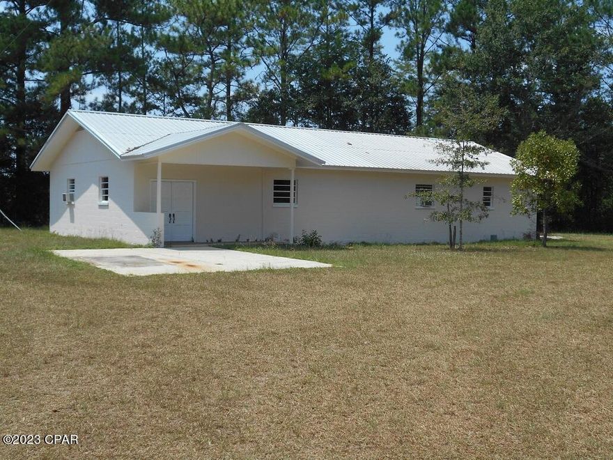 Former VFW on 1.7 acre in Vernon. Concrete block, metal roof, new: well & septic.