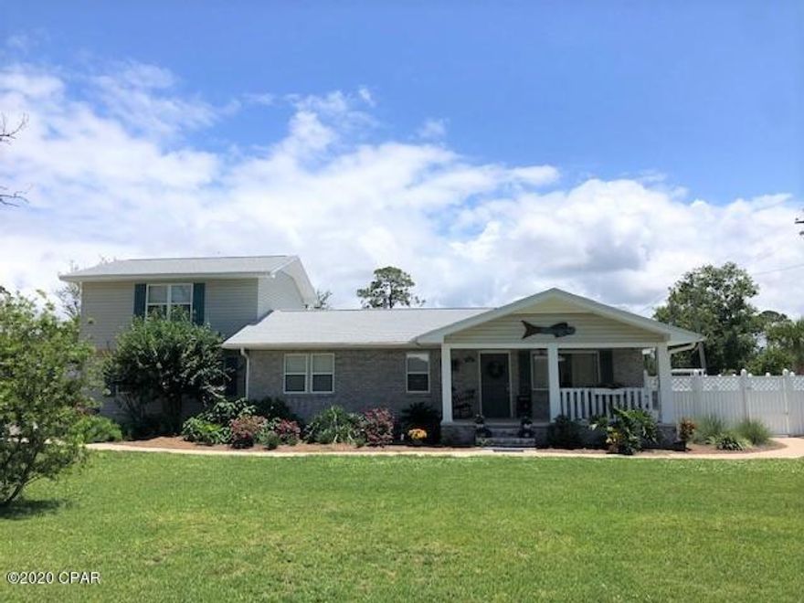 Very nice 4 bedroom home with pool that was completely remodeled in 2019. Spacious home with lots of room for a big family. The master bedroom is located upstairs and offers privacy and solitude from the rest of the home. Two living/dining areas downstairs, great outdoor space, and 3 additional bedrooms and 2 full baths are located downstairs. The home's finishes in the recent remodel were upgraded throughout the home. Beautiful Coretec flooring, stainless appliances, new cabinetry, and quartz countertops are just some of the nice features you'll find. This home is located on a large corner lot in a great neighborhood in Port St. Joe.