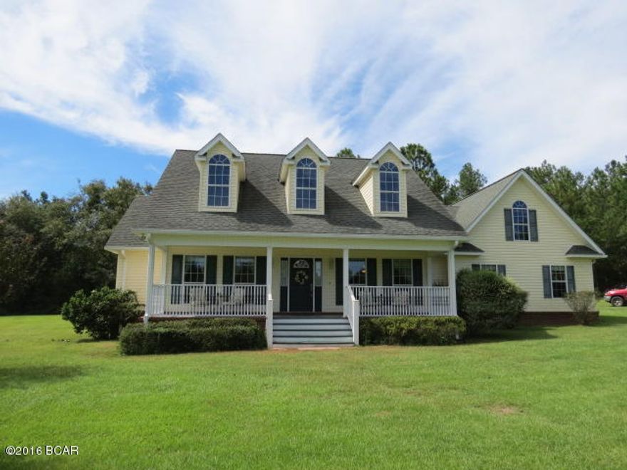COUNTRY AT IT'S BEST!! This Beautiful 3/2 Custom built home features a foyer, dining room, a renovated kitchen with island, quartz counter tops, new garbage disposal, the appliances are energy efficient. The kitchen opens up into the living room. This home has laminate and ceramic flooring, Trey Ceiling, Crown molding, built in entertainment center the T.V stays, new light fixtures, new paint, security/surveillance system, security/flood lights on home, shed, and garage. Nice size master bedroom with walk in closets, master bath has whirlpool tub, and separate shower. Laundry room is 11x12 with built in corner office. From living room walk out onto a screened porch, great for entertaining. Behind the home there is a storage shed with 220 outlet, A/C, and carport. Beside the home is a newly finished insulated w/loft storage garage/carport with 220 outlet and a sink with water to clean your fish. Property also has fig, persimmon, pear, grapefruit and apple trees. All setting on 4.24 ac. A MUST SEE!! MAKE YOUR APPOINTMENT TODAY BEFORE IT'S GONE!
