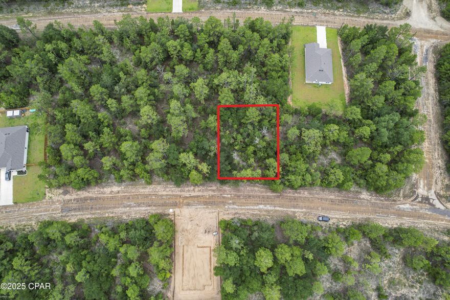 Wooded Lot in Sunny Hills Subdivision. Located north of Panama City and South of I-10 & Chipley. Close drive to Boat Lake & Sunny Hills Golf Course. Short drive to Hwy 77.