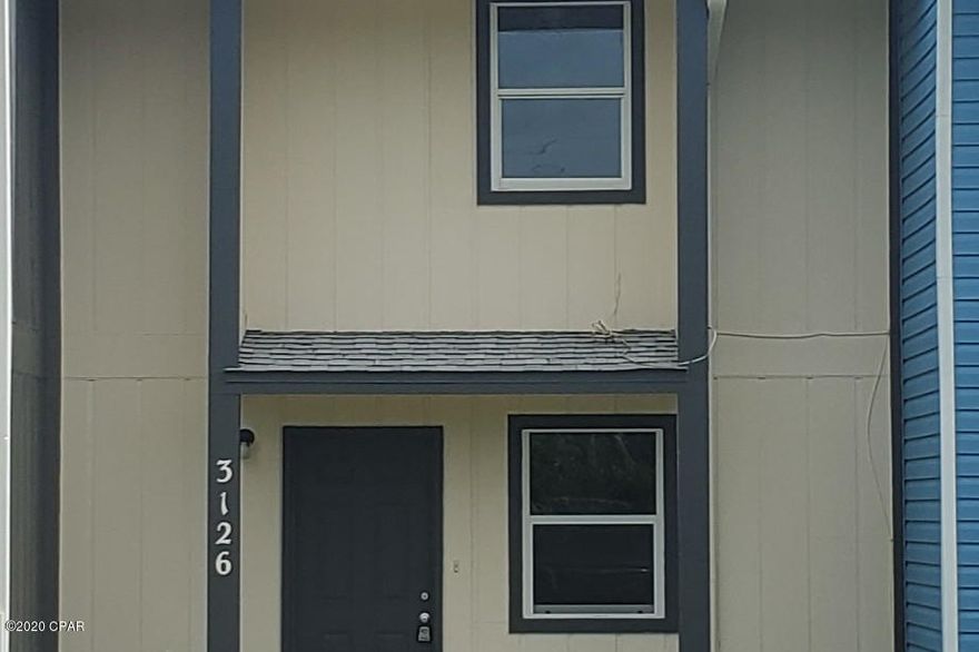 NEWLY REMODELED 2 Bedroom 1.5 Bath Townhouse located in Panama City. New vinyl plank floors throughout. Kitchen has brand new cabinets and countertops! Fenced in backyard is low maintenance and perfect for entertaining! New bathroom vanities and mirrors! Come see today!