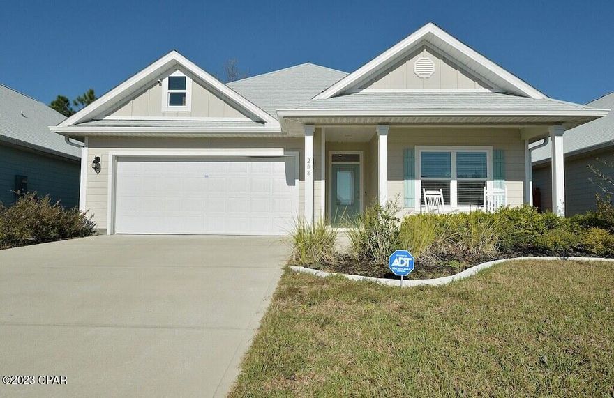 Huge Price Drop! Don't miss this one, join us for Open House Sunday 11/05/23 from 12:00 pm until 2:00pm. Sellers say bring them an offer!! Beautiful immaculately maintained Craftsman style home in Emerald Cove Villas. This neighborhood does allow for short term rentals if you choose. This home is in a very convenient location being only a quick 5 minute drive to the beach, shopping ,grocery stores and more. Also a quick drive over the bridge to Panama City. The open floor plan of this''Lamar Plan'' is very spacious inside and features Trey inserts in the ceilings, LVP flooring in the common areas, stainless steel appliances, and a neutral paint scheme. The current owners have added a luxurious fireplace in the living room, beautiful backsplash with accent lighting in the kitchen. The home is being sold with almost new furnishings, minus the master bed. The home does offer a full two car garage and a covered back porch and lots of storage space. The back yard backs up to a wooded area giving the patio a good deal of privacy a fence could be added if you have small pets who need a yard to play in. Don't miss out on this lovely home now priced below appraisal value!