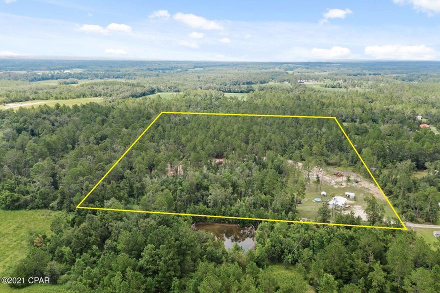 CURRENTLY UNDER CONTRACT, SELLER ACCEPTING BACKUP OFFERS. Enjoy the peace and serenity of country living on this 19.7-acre homestead! Inside this renovated 3 bedroom, 2 bath mobile home you will find an open concept, split floor plan boasting laminate flooring, custom stained trim and a spacious master bedroom with walk-in closet and en suite bath. Enjoy time outside swimming in the above ground pool, hunting, gazing up at the stars from the back porch or riding 4-wheelers. Property offers many potential new homesites and is conveniently located just a short drive to Hwy 77 and Interstate 10.