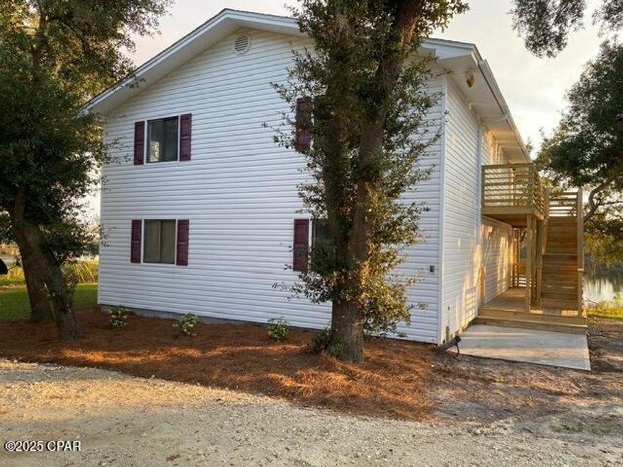 Waterfront! Downstairs Unit #B
3 bedroom 2 bath home features open living area, LVP flooring throughout, large screened in waterfront porch, open patio deck and lawn service included. 
W/D hookups.
Home is on septic tank and Bay County Utilities Water.
Only 2 parking spaces. Waterfront and lawn is shared with upstairs tenants. 1 dog under 20 lbs.$50 Pet Fee/$250 Pet Deposit/$25 Per Month Pet Rent.