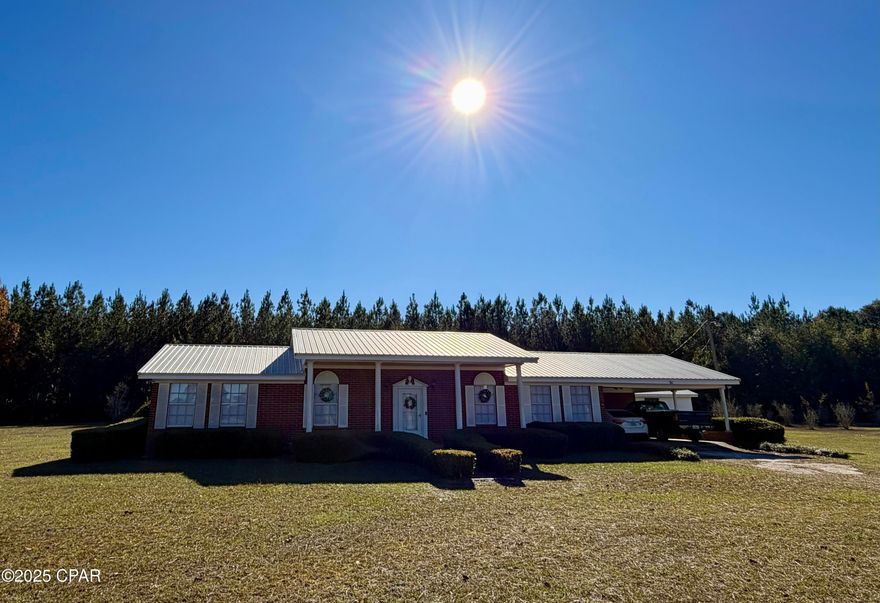 Dreaming of country living? This well-maintained 3-bedroom, 2-bath brick home sits on nearly 3 acres just outside of town, offering the perfect blend of privacy and convenience.
Inside, you'll find an open floor plan featuring an eat-in kitchen ideal for family meals, along with a formal dining area for gatherings. The kitchen boasts pecan cabinets, granite countertops, ample pantry space and a gas stove. The master bedroom includes an en-suite bath with a step-in shower. Laminate wood and tile flooring run throughout the home for easy maintenance.  Start your mornings or unwind in the evenings in the large sun porch—perfect for relaxing or entertaining.
Outside, the property includes a 16x22 detached garage/workshop with concrete floors, electricity, and water. Enjoy fruit trees such as pear, peach, and pomegranate. With minimal light interference, this property is ideal for stargazing and enjoying breathtaking night skies!
Come experience country living at its best!