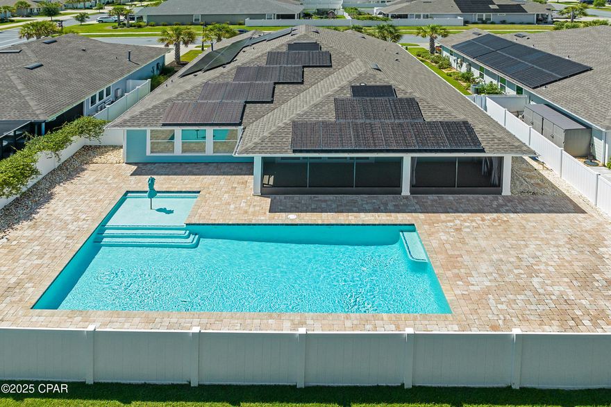 **PRICED TO SELL** 4BR + FLEX ROOM, 3BA, 3-CAR GARAGE, POOL, SOLAR, SCREENED PATIO, NEW PAINT, NEW LVP —
This freshly painted and beautifully maintained David Weekley Clarabelle floor plan in Breakfast Point offers a rare blend of function, efficiency, and lifestyle. Featuring 4 bedrooms, 3 full baths, a versatile flex/bonus room, and an open layout, this home is designed for both everyday living and entertaining.

The chef's kitchen includes a large island and pantry, while the split-bedroom design provides a private primary suite with a super shower and oversized walk-in closet. SOLAR PANELS significantly reduce energy costs—especially valuable with the saltwater pool and screened-in lanai that anchor the fenced backyard retreat.

Other highlights: brand-new LVP in all bedrooms, Ecobee thermostat, 7.1 pre-wired surround sound, TV hookup on the lanai, insulated interior walls, an oversized driveway, and a 3-car garage with attic storage.

All of this in one of Panama City Beach's most desirable communities—walk to A-rated schools, enjoy neighborhood parks, trails, and playgrounds, or take a quick golf cart ride to the beach.