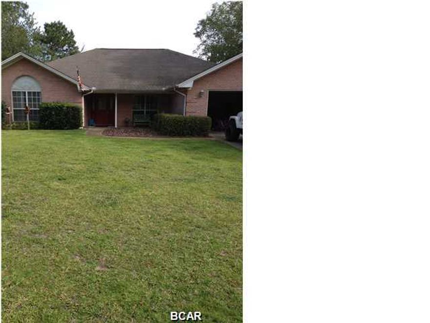 Centrally located home close to shopping, schools and hospital. House has light and airy open floor plan with ceramic tile floor in living room, formal dining room, kitchen and baths. French doors open to screened in patio and in ground pool. The kitchen has a breakfast bar as well as an eating area overlooking privacy fenced back yard. Master bath has separate shower and garden tub. Split bedroom plan.