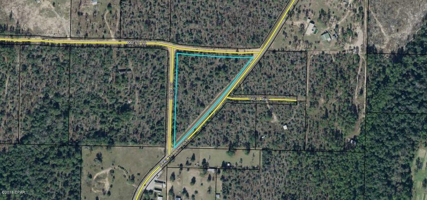 CURRENTLY UNDER CONTRACT, SELLER ACCEPTING BACKUP OFFERS - 5.2 Acres in the country. Frontage on paved road and county maintained roads on 2 other sides. Lightly wooded. Nice and quiet area.