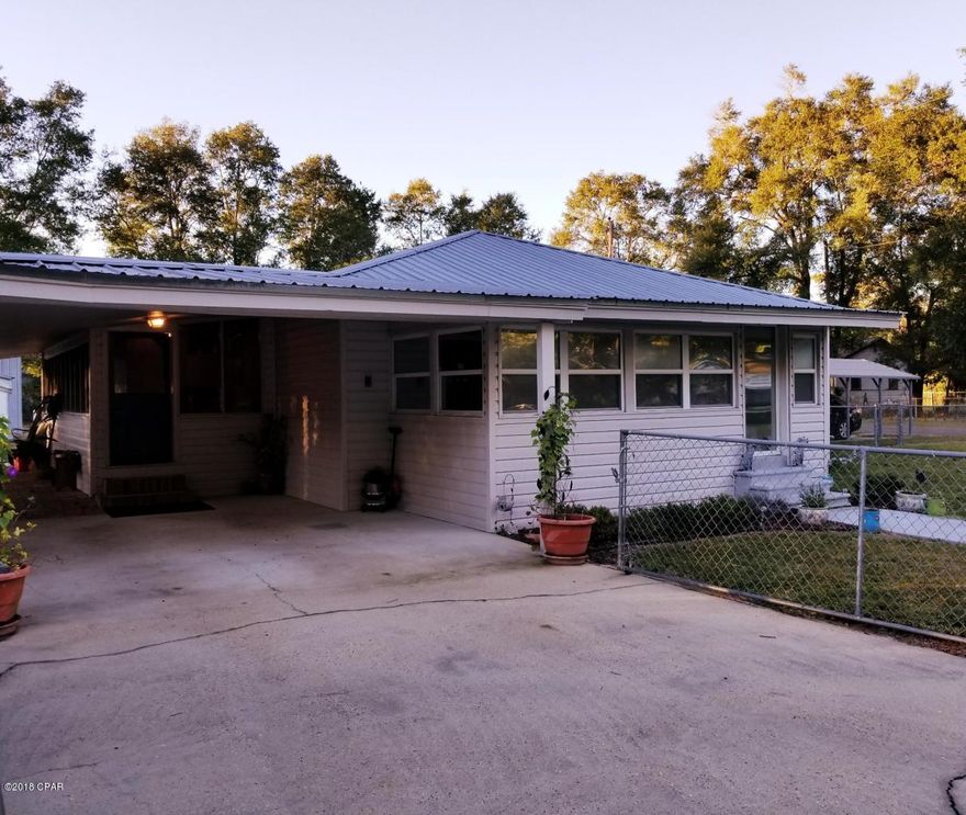 Check out this charming home for the family that needs a lot of space. This 3 bedroom, 3 bath home has a large mudroom and sun porch for your family to spread out and the 1/2 acre yard is fully fenced in. If you like to work on cars, boats etc...you will LOVE the back yard shed. There are separate rooms for storage, crafting, gardening, repairs and even a paint booth. Be sure to check out the upstairs man/cave or office to escape to as well. The 3rd bedroom and bath can be locked out and features it's own entrance with carport in case you need an in-law suite. This versatile home with so much family space will go fast so make an appointment today and do not miss out.