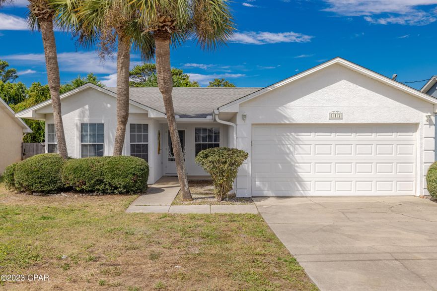 Beautiful home right down the street from the emerald, blue waters of the Gulf of Mexico.  3 bedroom and 2 bath home with a huge, enclosed Florida room that is not included in the square feet.  Nicely landscaped and fenced backyard.   This property is centrally located to most amenities of Panama City Beach.  All information is approximate and taken from the Public Records.  If important to buyer, please verify.