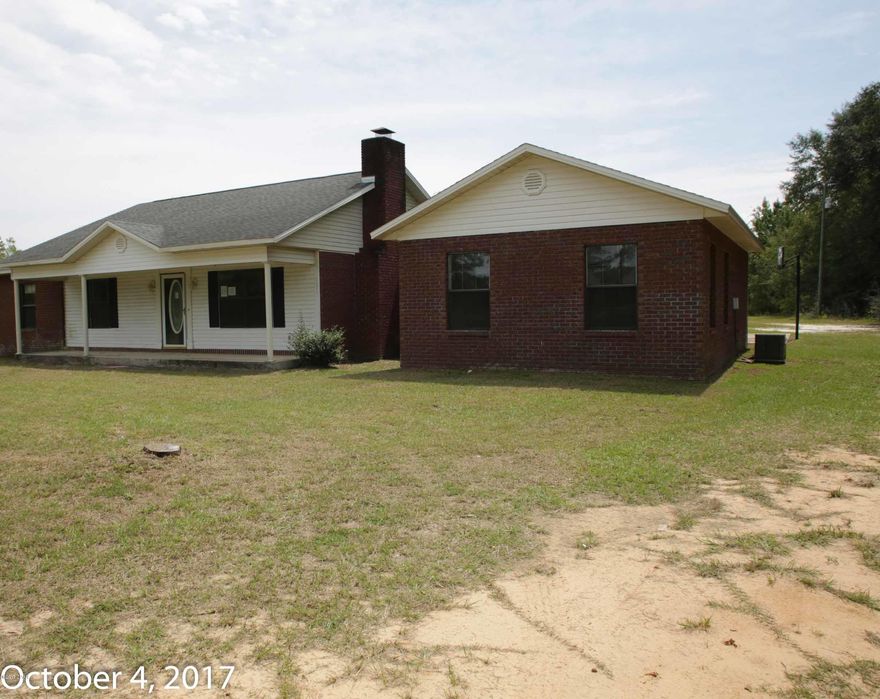 Large home with inground pool, fenced yard on a six acre lot.  The home features a family room with fireplace, large kitchen with an abundance of cabinets, a  formal dining room, a large den, 3 bedrooms and 2 1/2 baths.  The master bedroom is separated from the other bedrooms and has a large master bath with a tub, separate shower and double vanity.  Great country location, very private and quiet.   All measurements are approximate and are not guaranteed, please measure to verify accuracy.