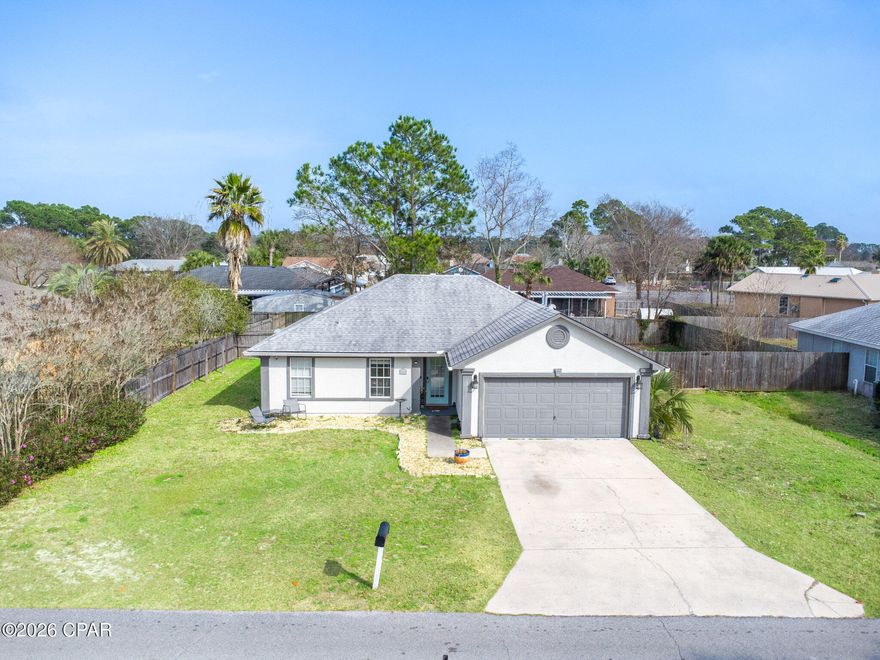 Beachside Living at Its Best! 

Welcome to this charming 3-bedroom, 2-bath home in the quiet and desirable Treasure Palms neighborhood on the east end of Panama City Beach. Just a short golf cart ride to the beautiful white sandy beaches, you'll love the coastal lifestyle this location offers -- with Captain Anderson's, Schooners, and St. Andrews State Park nearby. 

Perfectly positioned between Front Beach Road and Navy Blvd, this home provides convenient access to local favorites including Bay Point Golf Club, ZooWorld Zoological Park, Signal Hill Golf Course, WonderWorks Panama City Beach, and Treasure Island Marina.

Inside, the home features a spacious living area with vaulted ceilings and a cozy gas fireplace. The kitchen is thoughtfully appointed with granite countertops, tile backsplash, and stainless steel appliances -- ideal for everyday living and entertaining alike. 

Step outside to a covered patio overlooking a large, private backyard with ample space to add a pool, garden, or play area. This outdoor setting offers year-round enjoyment and plenty of possibilities. 

Additional Notes: Room sizes are approximate; buyer to verify if important. Property is currently leased through 02/28/2026. Interior is being freshly painted -- updated photos coming soon.

Whether you're seeking a primary residence, second home, or investment opportunity, this Treasure Palms gem delivers location, comfort, and coastal charm.