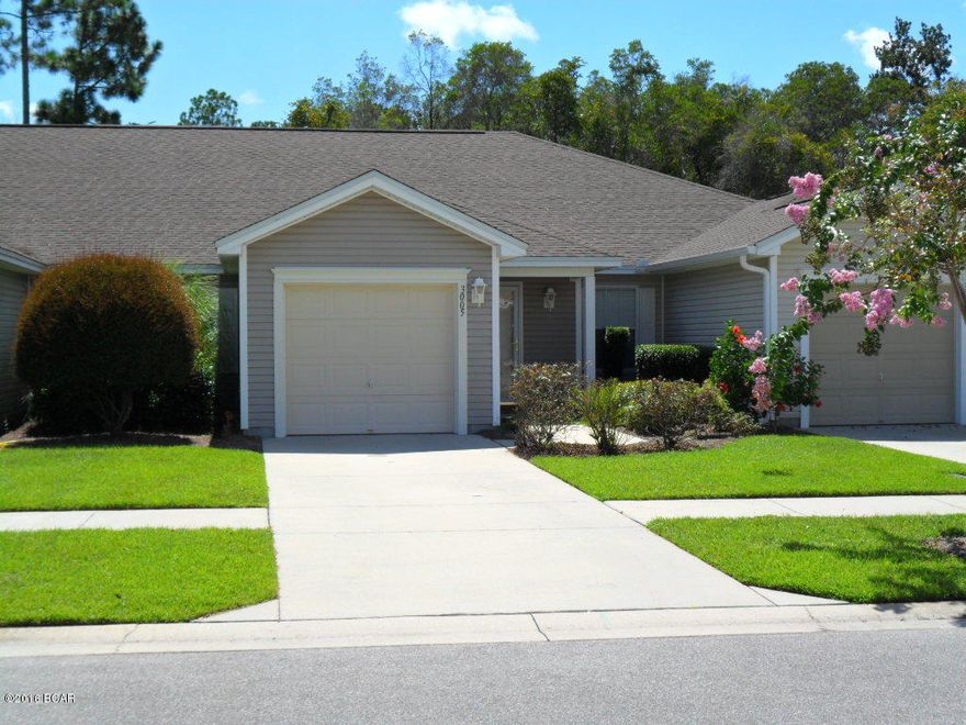 Very well maintained home in popular Hammocks Subdivision. A very quiet community which has a lot to offer: community pool; basic lawncare and grounds keeping; low maintainence exterior. A great walking and biking community with sidewalks; NO through traffic. Home is 2B/2Ba and offers a split plan. Open floorplan goes from front entry through living, dining, kitchen and breakfast all the way to the rear sliding doors. Lots of room. Master bedroom and eat-in kitchen look out to the wooded conservation area in the back yard. There's a screen porch out back too! There's a single car garage.