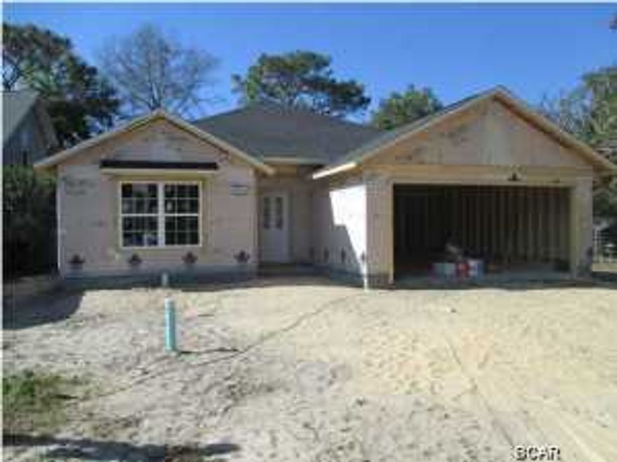 Fantastic home under construction in a fantastic location - at the foot of the Hathaway Bridge and convenient to all of the beach amenities but still very close to town, Tyndall Air Force Base and almost across the street from the Navy Base. This is WOODLAWN VILLAGE...A new subdivision featuring craftsman style homes which are perfect for young families, singles, or someone looking to downsize. This home is a 4 bedroom, 2 bath and almost 1600 square feet with a split floor plan featuring a large kitchen overlooking an oversized great room, formal dining area, breakfast nook and large master bedroom with walk-in closet, two-car garage, and great curb appeal. THIS IS A GREAT PRICE FOR A FOUR BEDROOM BRAND NEW HOME ON THE BEACH!!! The home is currently under construction and it won't