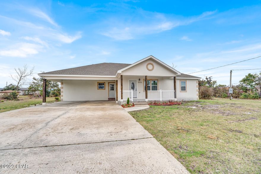 This 4 Bed/3 Bath home with TWO master bedrooms with en-suite baths is a beautiful new construction with modern touches. The sits home on almost .50 acres in a quiet, up and coming area. This home features a massive kitchen for entertaining, 20ft ceilings in the living room, tray ceiling in the bedrooms, brand new quarts counters, vinyl plank flooring, marble tiled bathroom & shower, large laundry room, carport & MORE. For the owners, they get to enjoy a quiet space along the back of the home with slider door to the back porch, large walk in shower, a walk-in closet plus his & her sinks! Behind the home sits a building for storage ready to be a great workshop or she-shed! Check it out soon! *Former home torn down, all 2022 plumbing, electrical, windows, a/c, water heater, foundation, roof