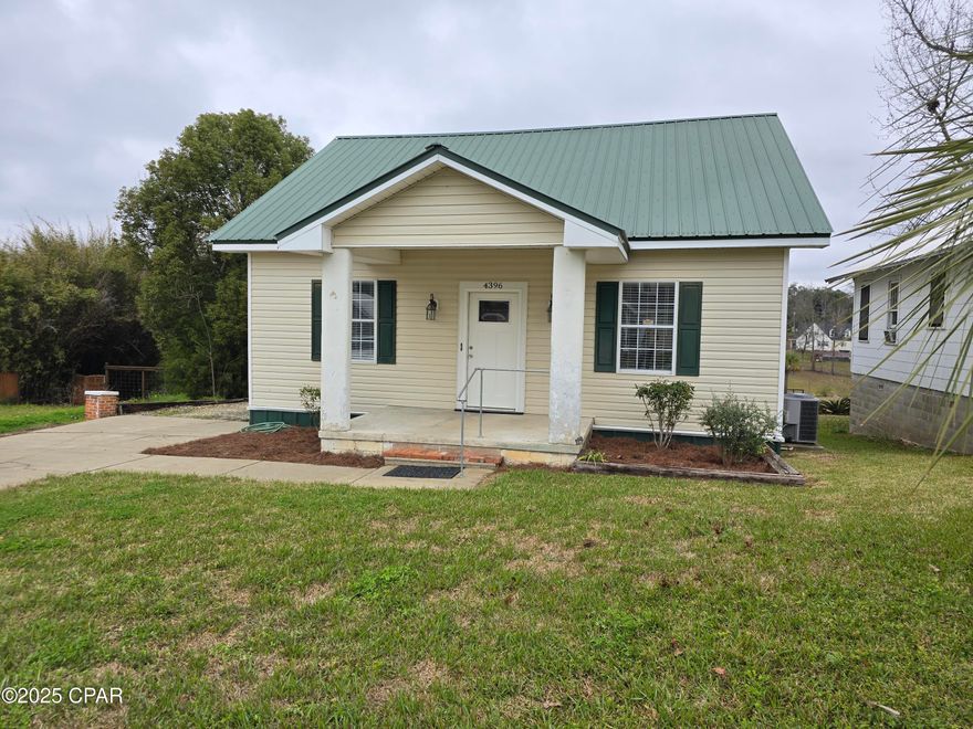 Beautifully maintained home in downtown Marianna overlooking Wynn Street Park .  This home features an open living room and dining room with a side bar area and refrigerator .  The ceilings in the living room/dining area as well as the master bedroom are beautiful T&G with a very high gloss finish enhancing the potential of this home .  The Home features a Galley Style Kitchen and is furnished with refrigerator , stove and dishwasher .  There is a breakfast Nook off of the kitchen that overlooks the park .  There is also a half bath off of the Breakfast Nook area and well as the laundry closet that comes with a washer and dryer .
The Master Bedroom does have a full bath and a walk in closet ( there is an Air handler in the closet ) 
There are two bedrooms upstairs in the gable section of the home so they do have slanted roofs and a Nook area for clothes .  There is a full bath upstairs and additional storage cabinet at the top of the landing going into full bath .

This home is extremely clean , located in an area convenient to shopping and close to Doctors and Hospital .  Would make a great home for a small family or for an individual that just needed guest rooms for family visits. The driveway to the back parking is rock and the parking area is rock and can accommodate approximately 6 vehicles , Depending on size ) The remainder of the lot is very minimal on lawncare that would be needed .  The lot ends at the back of the parking area . 

There is room under the rear deck for additional storage as well as an oversized crawlspace area that could be made into additional storage .

Must see to Appreciate !