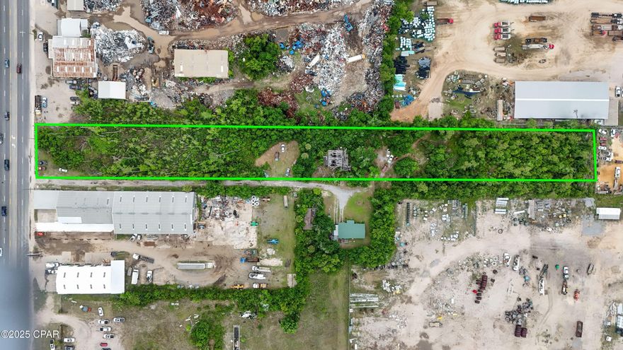 3.3 acres of light industrial vacant land on E 15th St . Approximately 125ft of road frontage. Great location for New Business lots of traffic ..