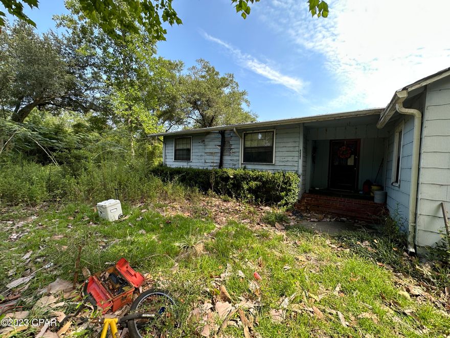 AS IS.  This 5 Acre Parcel is right off of Hwy 71 just south of Malone.  It is on the Corner of Bevis and Hatcher road in Rural Jackson County.  The house appears to be not habitable and if you go in the house WEAR A MASK and go at your own risk.  There are some beautiful old trees on property.