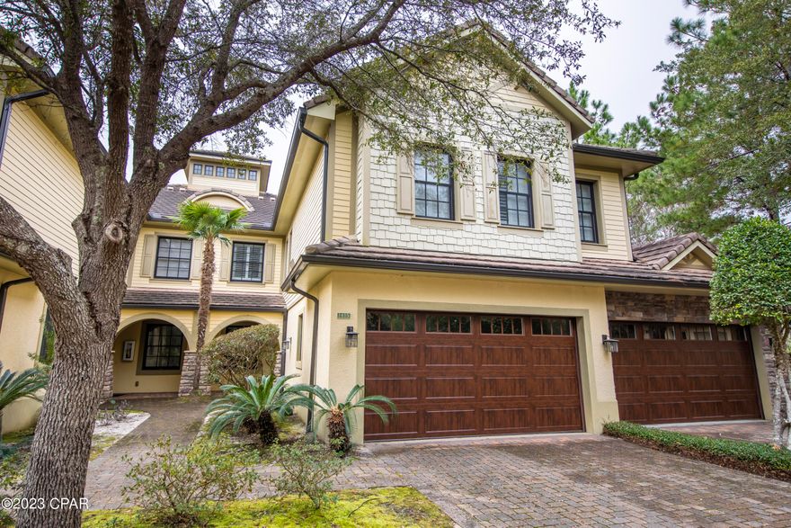 CURRENTLY UNDER CONTRACT, SELLER WILL CONSIDER BACKUP OFFERS. Welcome to single-level living on the 9th hole in Wild Heron offering one-of-a-kind amenities including access to Lake Powell and the award-winning Sharks Tooth Golf Course, lakeside pool, nature trails, and more all nestled within this quiet gated community.  Unit 1413 is conveniently located on the ground floor with a paver stone entry and driveway, 2-car garage, and an oversized screened-in porch with 8' sliding doors that offer ample natural light and maximize views of the golf course. This unit is selling fully furnished with new beds and mattresses, new carpet in the bedrooms, and a new HVAC system installed in late 2022. The open floor plan is paired with 9' ceilings and 8' doors, and the kitchen features stainless steel appliances, granite countertops, breakfast bar READ MORE island, glass tiled backsplash and large pantry. Just off the kitchen is a dining area that can easily be converted to a secondary living space, library, or office! The Master Suite is spacious with a large bay window offering views of the golf course and large walk-in 'His & Hers' closets. The Master Bath features tile floors, granite countertops, double vanities, jetted garden tub, and separate walk-in shower. The 2 additional guest rooms share a large guest bath with an oversized tub and shower. 

This 2040 SF, 3 bedroom, 2 bath condo is located in Clubside II of Wild Heron. Clubside II is a low-density, 12-unit association comprised of 3 buildings with 4 units in each.
Wild Heron is a 750-acre Coastal Sanctuary incorporating the coastal lifestyle with top-notch amenities including the Greg Norman designed Sharks Tooth Golf Club, multiple pools, fitness center, kayaks, access to the Gulf, professional croquet courts, Har-Tru-Hydrocourt tennis courts, boardwalks, and 24/7 security. Golf, tennis & Beach Club Memberships available through St. Joe. Information contained within this listing such as square footage is deemed to be accurate but is not guaranteed. Buyer to verify.