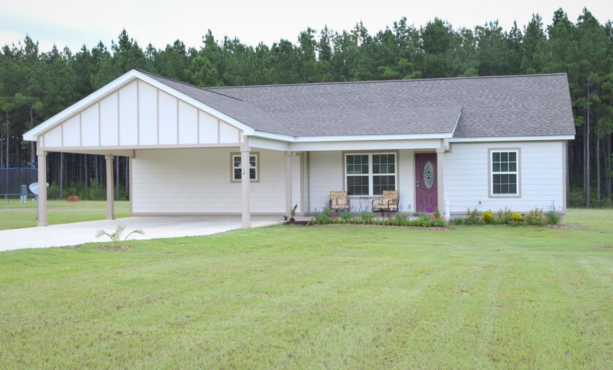 Don't miss your chance to own a like-new, one owner home in the up and coming Lakepointe subdivision. This 3/2 split bedroom, open concept home is move in ready. As you walk through the front door, you will notice the gorgeous bamboo floors, cathedral ceiling. kitchen with custom cabinets, granite counter tops, stainless steel appliances and a breakfast bar that is open to the living/dining room. Just off the living room are 2 additional spacious bedrooms and a full bath. The large master bedroom has a walk-in closet and an on-suite bath that features double sinks, granite countertops and a custom linen cabinet. Outside features include attached carport, large covered front and back porches, hardie board siding and underground utilities. This home has a lot to offer, so don't miss it!