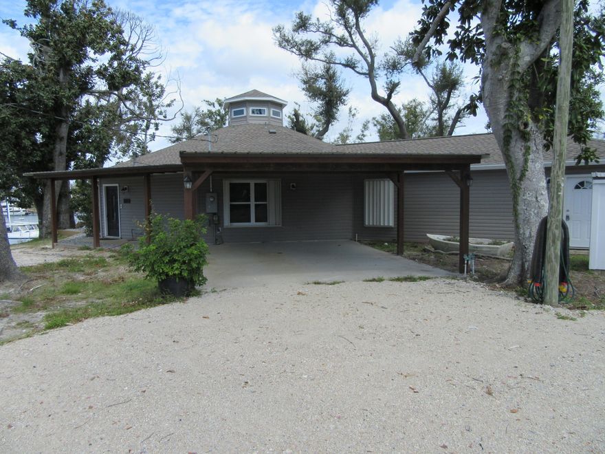 Beautiful waterfront 1 story home on East Bay located in the much desired community near Tyndall Air Force Base in Panama City. This beautiful completely remodeled 3 bedroom 2 bath home is convenient to shopping, dining, the best schools and centrally located to the Worlds Most Beautiful Beaches and Military Installations. Improvements include but not limited to, new wood plank flooring, new paint, trim, upgraded fixtures, granite, and back splashes. Living area is a very large open space with a very unique octagon vaulted ceiling focal point and a island wet bar for entertaining. All property sizes and ages are approximate, please measure and/or verify if important. School assignments are subject to change, please check with Bay County for most accurate information. Deposit is the same as the rent. Pets allowed. Breed restrictions apply with owner approval only.
