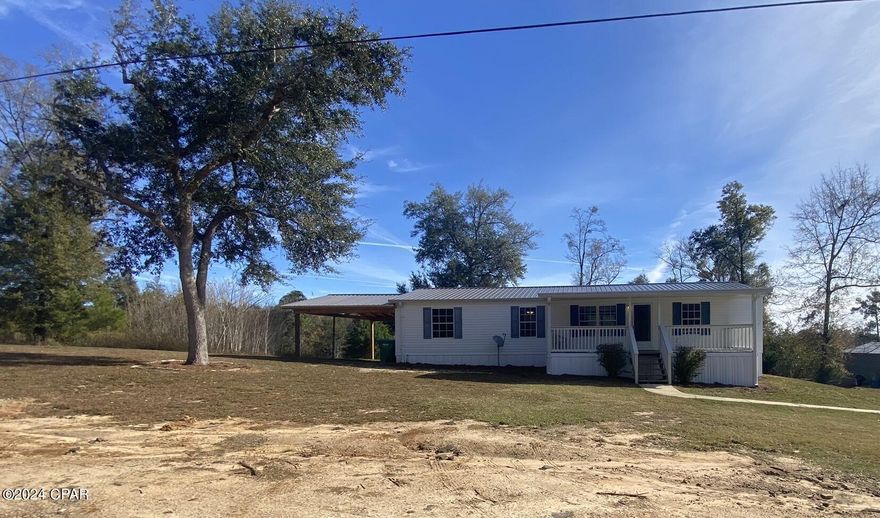 Beautifully remodeled home sitting on over an acre on a dead end road in the city limits. Perfect for that growing family or a family that just likes the quietness. Outside is a covered porch on the front, a 24 x15 carport, the homes metal roof is less than two years old, huge 30 x13 new deck on the back, also a small new deck with entry to the laundry room. There is a partially enclosed 30 x13 pole barn. Inside there are new top of the line electrical and plumbing fixtures. Split floor plan, all bedrooms have walk-in closets, vinyl plank flooring, double pane windows, new kitchen appliances, HVAC is 3 months old. Excellent internet service through Century LInk.