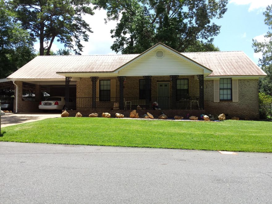 BRING ALL OFFERS!!! MOTIVATED SELLERS...Corner Lot, Nice Brick Home in a quiet area of downtown Chattahoochee. This 3 bedroom, 2 bath 1600+ Sq Ft, 1 bedroom and play room/recreational room upstairs, 2 AC units for heat and cooling downstairs and upstairs, recent metal roof and carpet, tile in baths and kitchen, tiled front porch, manicured lawn, completed enclosed 6'x22' utility room that leads out to the detached enclosed 14'x30' workshop, plus 12'x30' heated and cooled shed with 1/2 bath. It is close to shopping and walking distance to town. This home would be a great starter home or retirement home. Come see and bring the family to enjoy the Chattahoochee River for great fishing, boating, camping and much more. Call Listing Agent for Showing Instructions.