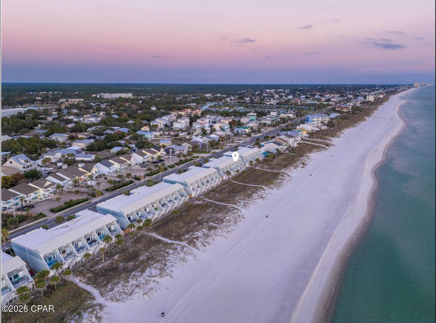 Experience the perfect combination of beachfront living and income potential with this 2 bedroom, 2 bathroom townhome plus a bunk room, ideally located along the Gulf in Panama City Beach. With a spacious layout and the added convenience of a private garage, this property is designed for both comfort and functionality--an ideal setup for a vacation home or high-performing short-term rental.

The versatile floor plan offers ample sleeping arrangements, comfortably accommodating up to 10 guests, with the potential to sleep 12 if a pull-out sofa is utilized. The bunk room adds valuable flexibility, making the property especially appealing to larger groups and families, helping maximize rental occupancy and income potential.

Bright, open living spaces are filled with natural light and coastal charm, creating an inviting atmosphere for relaxing or entertaining after a day at the beach. Just steps from the sand, guests will enjoy effortless access to the Gulf while also being conveniently located near popular dining, shopping, and entertainment along Front Beach Road.

With strong rental demand in the area, a layout designed for group stays, and desirable features like a garage and additional sleeping space, this property presents an excellent opportunity for investors or those seeking their own beach retreat with income potential.