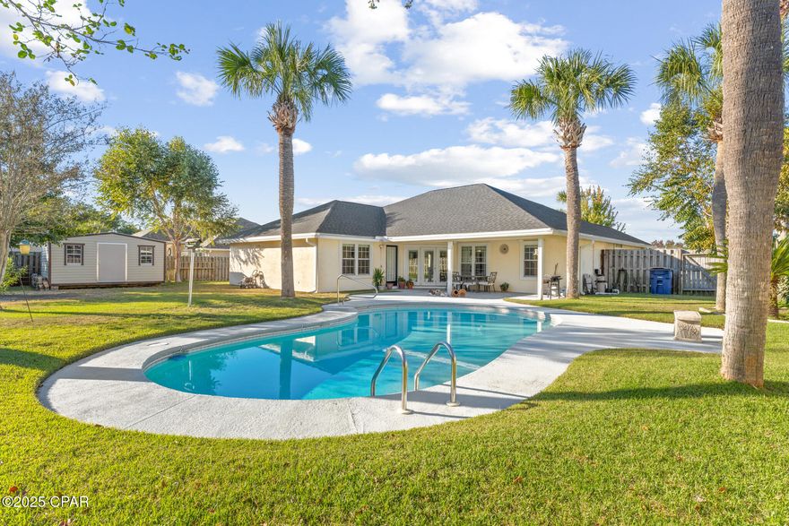 Make every day feel serene in this home with a pool located in the sought after neighborhood of Northshore, with its own sparkling backyard oasis.

This inviting 3-bedroom, 2-bath home offers a spacious layout designed for everyday living and relaxed entertaining. You'll have plenty of space with 2 living room spaces for the family to spread out. Located in the highly sought-after Northshore community, this property combines convenience, charm, and a true sense of home. Enjoy riding bikes or walking through this neighborhood with sidewalks, and friendly neighbors. 

Step inside to find a bright, open-concept living area featuring raised ceilings, a cozy fireplace, and sunlit spaces that flow effortlessly throughout. The kitchen is equipped with stainless steel appliances, an island with breakfast bar, and plenty of counter space—perfect for casual meals or hosting family gatherings.

The primary suite offers a private retreat with a soaking tub, separate shower, double vanity, and walk-in closet. Two additional bedrooms provide flexibility for guests, a home office, or a hobby space.

Enjoy outdoor living at its finest in the fenced backyard complete with an in-ground pool, open patio, outdoor shower, a nice storage shed, and beautifully landscaped surroundings. Whether you're swimming, grilling, or relaxing under the covered porch, this backyard is built for year-round enjoyment.

Located just minutes from North Bay and popular spots like Bayou Joe's, Uncle Ernie's, and Historic St. Andrews, you'll have easy access to dining, shopping, marinas, and water activities. Golfers and outdoor enthusiasts will appreciate the nearby courses and parks, while top-rated schools such as Northside Elementary, Mowat Middle, and Mosley High add to the appeal.

With its prime location, thoughtful layout, and private pool oasis, this home offers the perfect blend of comfort, lifestyle, and value.