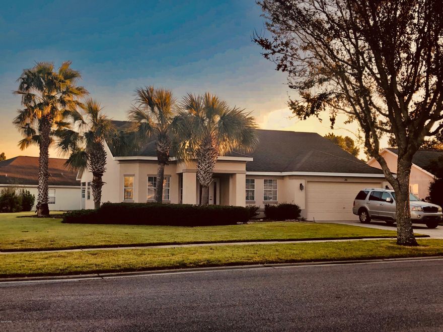 Must see 3 bedroom, 2 bath home on a beautiful corner lot located in Phase 1 of Palmetto Trace. Enjoy all this open floor plan home has to offer from the bright kitchen with breakfast nook that overlooks the large great room with built in fireplace to the spacious master bedroom with private ensuite. Then walk outside onto your covered patio and enjoy an oversized back yard or take a ride on the golf cart to one of two community pools. Palmetto Trace is also conveniently located next to all the attractions and restaurants of Pier Park, Frank Brown sports park, as well as quick access to the beach. Buyer is responsible for verifying details about this property. All information is deemed to be accurate but not guaranteed.