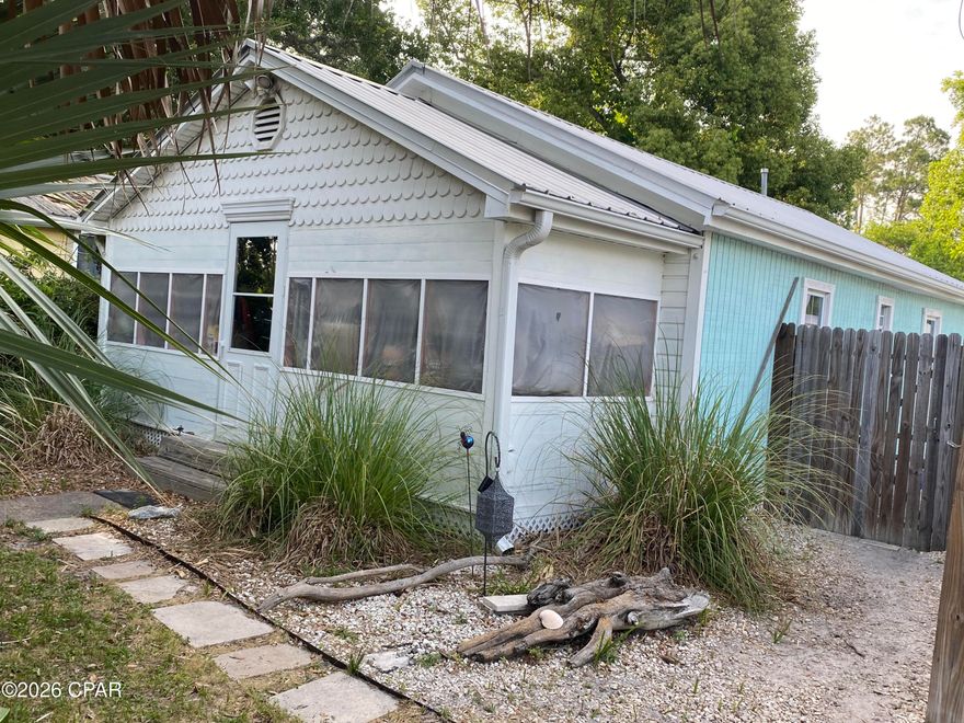 Completely renovated cottage. Looking for an economical property close to Beaches, Bay, Boat ramp and shopping in an ''X'' flood zone. This great residence fills them all! Two bedroom two bath rustic Florida cottage just Minutes to downtown Port St Joe restaurants and shopping. This lot is just two blocks from St Joe Bay , A short golf cart ride to town and 10 minutes to the beaches. Completely remodeled with brand new appliances. Double fenced yard. The property can also include an almost new RV, 2021 Keystone Cougar Half Ton with bunk room, used 2 times for 3 months, for additional cost. Brand new Generac Whole house generator, Complete sprayed attic insulation and outdoor shower. Income property galore.