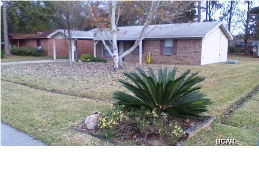 Cute 3 bedroom 1.5 bath home with carport. This unit has fresh paint and new tile through out, french back doors leading to fenced backyard and 10 x 20 yard building.