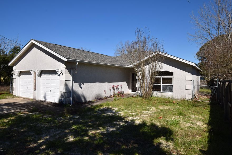 Riviera Beach home! Perfect for a 2nd home or a rental investment. Public beach access 4 blocks away. This home is conveniently located to Pier Park, shopping, dining, & the World's Most Beautiful Beaches! Panama City Beach is consistently ranked one of the best beaches in the US. The garage was being turned into a small apartment for extra rental potential.  If you want a larger lot, the adjacent vacant lot 21518 Dolphin Ave is available as well. Measurements approximate, verify is important.