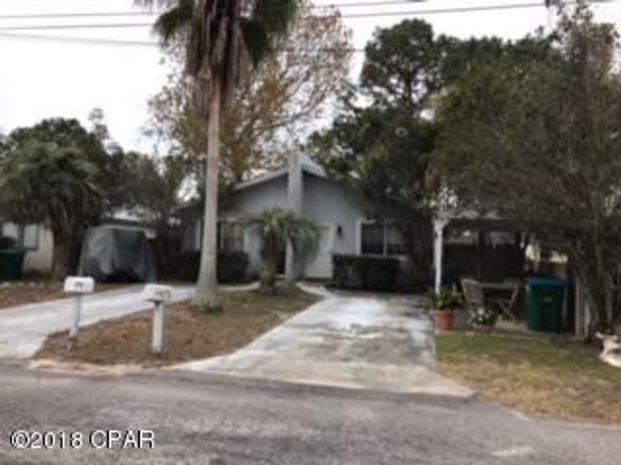 GREAT investment, money making, long-term rental property in Panama City Beach. This awesome duplex 2-(1bedroom/1bath) is in a great location near the Navy Base, the beach, and the lagoon. Annual rental income currently at $14k with potential for more. 1,200 sq ft both with privacy fenced in backyards. Both tenants are month to month. 1 Tenant has been in place 15 years and the other almost 2. Tenants should pay for water. Septic updated in 2014. Property goes 10 feet past existing fence. Small structures belong to seller and have no value. All dimensions are approximate and should be verified if important.