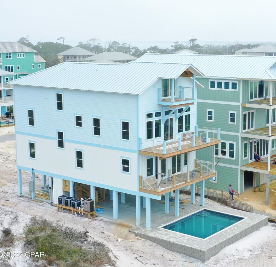 This is going to be one, if not, the nicest home on North Cape San Blas. Located on a fantastic area of the beach. This owner knows what a home needs to make guests happy and has built this same home already. This home is still under construction and scheduled to be completed late Spring/early Summer of 2022. The finished interior pictures are from the finished home, not this home. This home was designed and is being built to be a superior vacation rental home with every feature guests desire from an elevator to private pool and much much more. Will sleep 30, rental projections of $268K/year and owner is requiring the new owner to agree to a 3 year management agreement with Cape and Coast Vacation rentals. X flood zone, minimum HOA dues of only $400/year