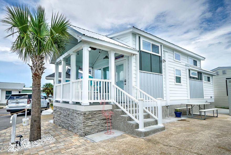 CURRENTLY UNDER CONTRACT, SELLER WILL CONSIDER BACKUP OFFERS. Check out this Venture Out Beauty! This brand-new home has a great open floor plan and flows beautifully. It includes a nice size living room and kitchen with high ceilings.  The shiplap and beachy decor really give it that coastal vibe you've been looking for... this home also includes bunk beds and a loft that is perfect for little ones and teens!  Also, a covered porch... great for relaxing! Venture Out offers BOTH beach and bay access... The resort has 2 pools, tennis, golf, shuffleboard, playground, basketball, fishing pier, boat dock with slips & boat ramp. Venture Out is a golf cart community that has exploded in popularity within the last few years. A gated, pet friendly community that's great for full time residency or just to vacation. 24-hour security - family frien
