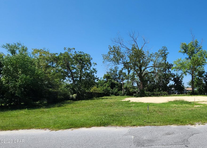Build your new home on this beautiful lot! Centrally located to everything, including Panama City Beach, Tyndall Air Force Base, The Navy Base, many shops, restaurants, parks, hospitals, Gulf Coast State College, historic St Andrews and many downtown attractions. Property located in flood zone X, (no flood insurance required) and the area has no HOA (Homeowner Dues). Lot is cleared and easy access to city water and sewer. Survey available. The next lot located at 1713 Calhoun Ave could be purchased together with this lot too. 
All information and dimensions are deemed accurate, but please verify if important to the buyer.
