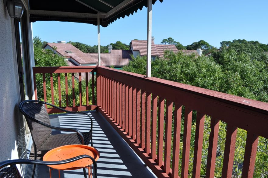 This Plaza of St Thomas condo has got the WOW factor!  Recently renovated and move-in ready, you'll love the hardwood floors, granite counters and stainless steel appliances in the kitchen, Tuscan style vanity and custom tiled shower in the bath and a large balcony that can be accessed from both the living area and the bedroom.  The complex features a  community pool and clubhouse, tennis courts and a boat dock on the lagoon. Not only are you conveniently located across the street from the beach, you're also walking distance to many restaurants, family-friendly amusements, clubs and shopping.    All information is approx. and must be verified by Buyers if important